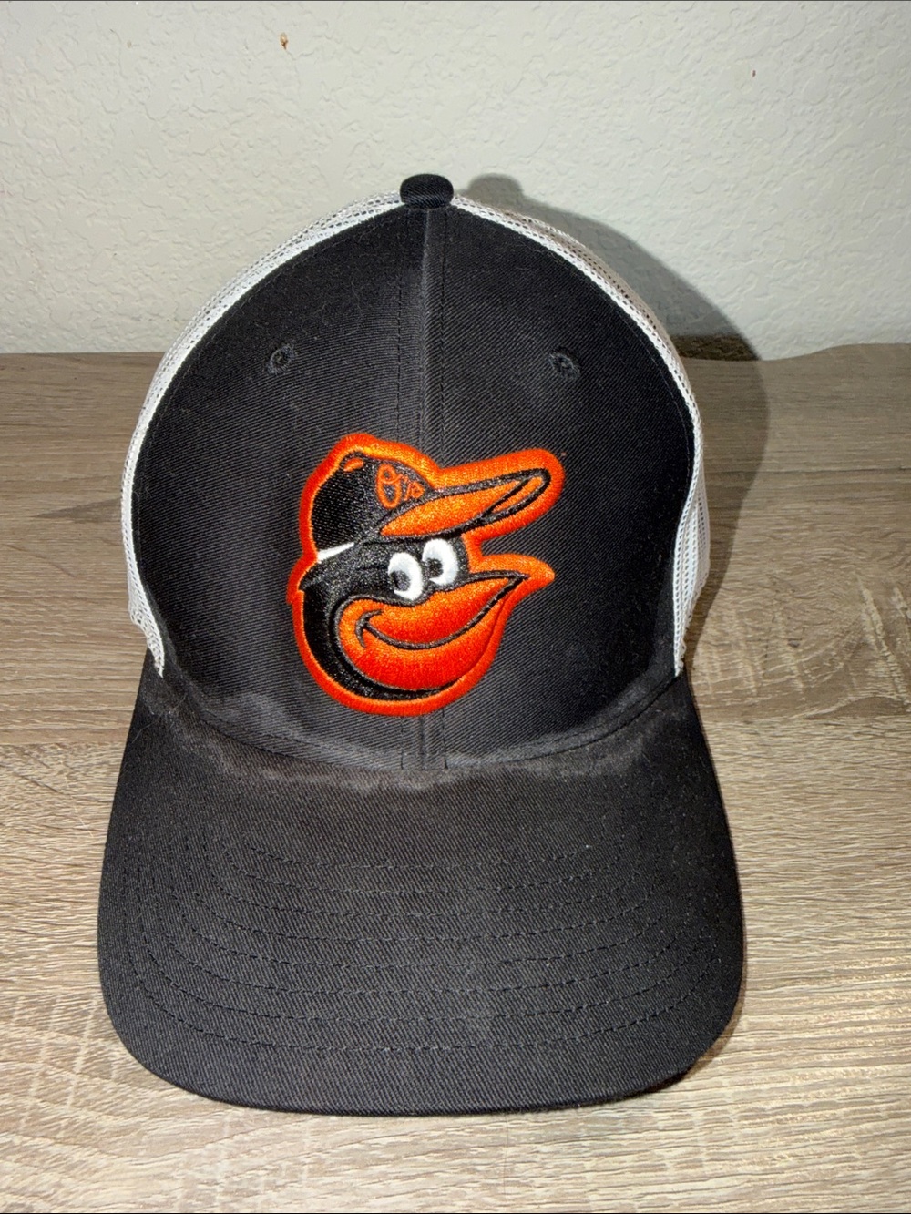 Black and White Baltimore Orioles Mesh Back Cap with Orange Logo